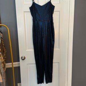 Rules of Etiquette navy sequin jumpsuit
Size medium